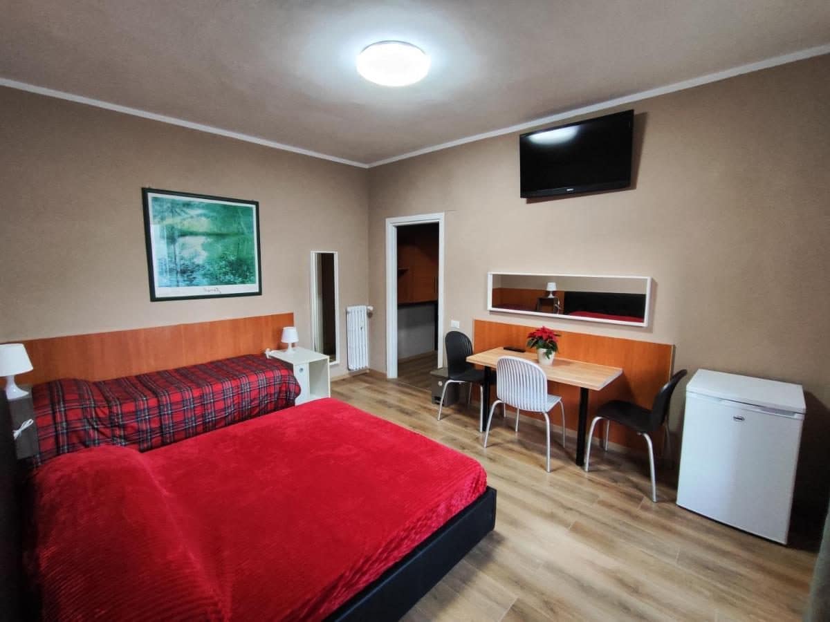 Une chambre avec coin cuisine. © B&B Bella Garbatella