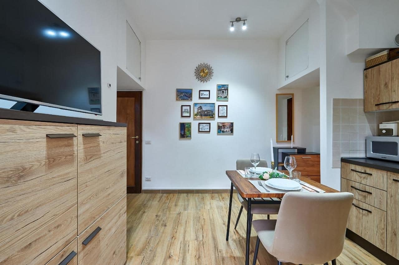 Le séjour et le coin cuisine. © Casa Garbatella