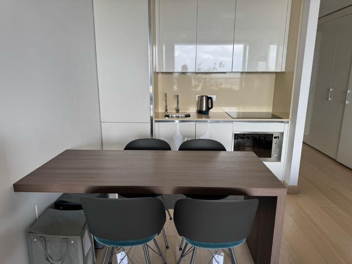 La cuisine et le coin repas. © Eurosky Suite Apartment
