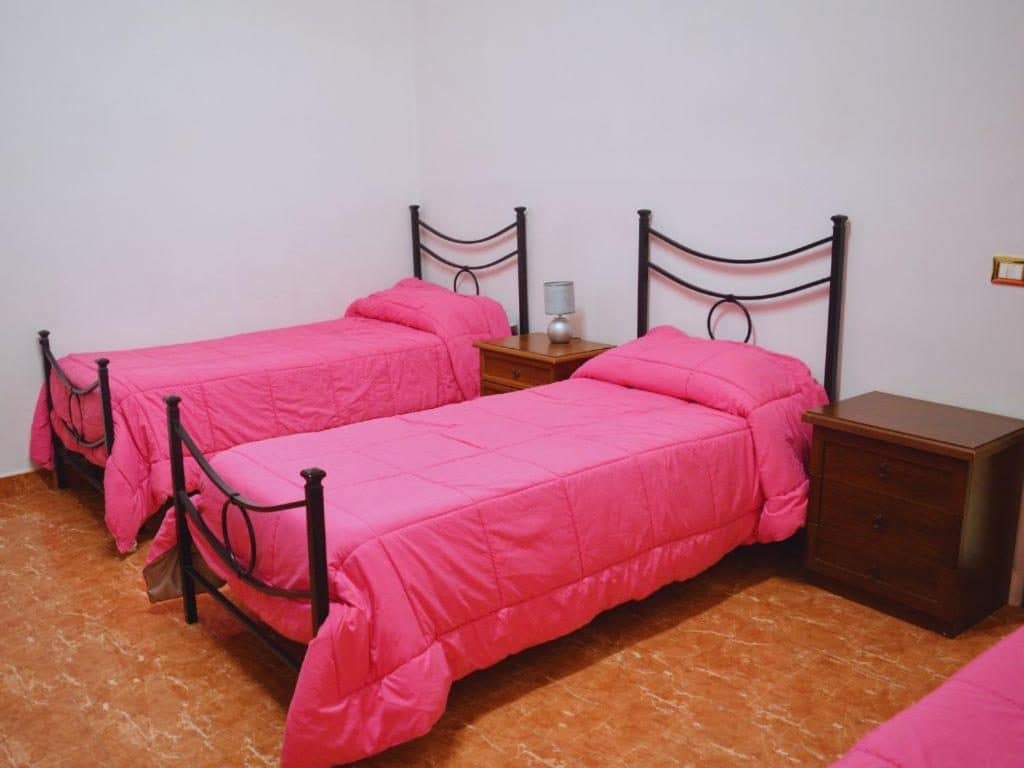 Une chambre à lits jumeaux. © Ostello Marello