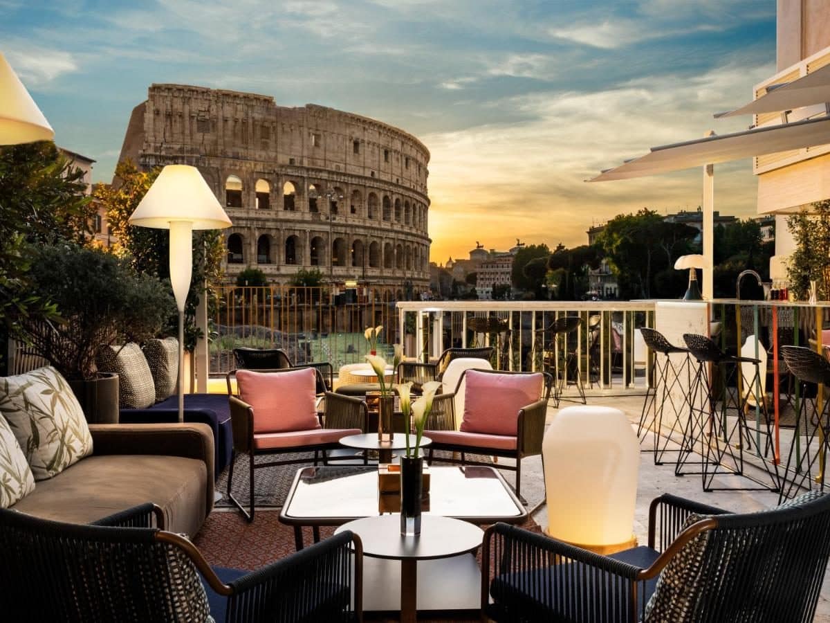 La terrasse au coucher du soleil, le Colisée en face. © Hotel Palazzo Manfredi